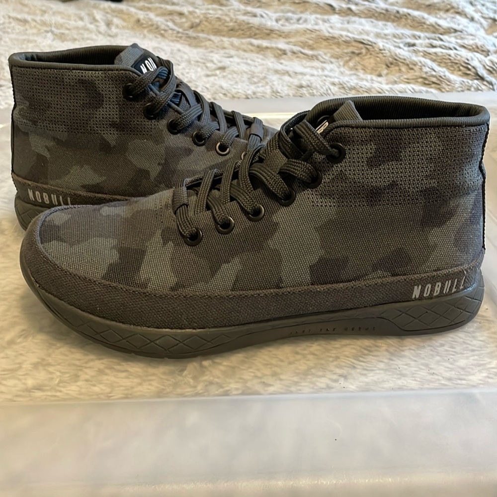 Woman’s NO BULL mid top canvas trainers; size 7; black camo